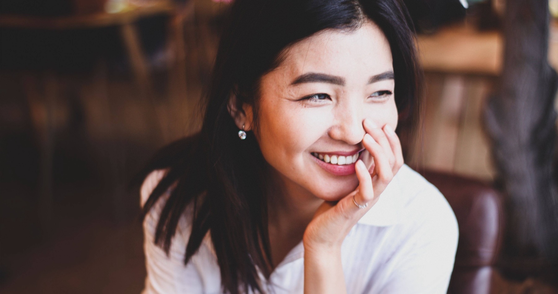 Lady smiling after veneers