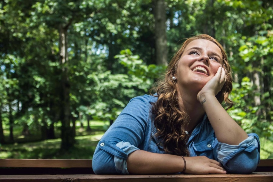 Girl smiling after dental crowns